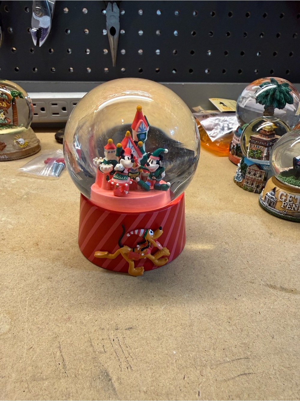 Red Holiday Snow Globe with Festive Characters